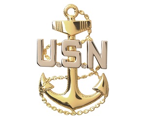 Navy Chief's anchor. A fouled golden anchor with the anchor chain looping back and forth behind it, and in Silver the letters U S N on front